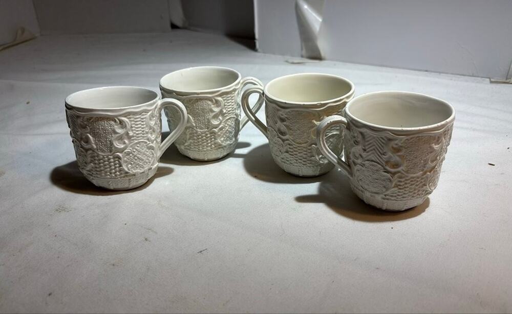 Set of Four Vintage White Embossed Ceramic Mugs